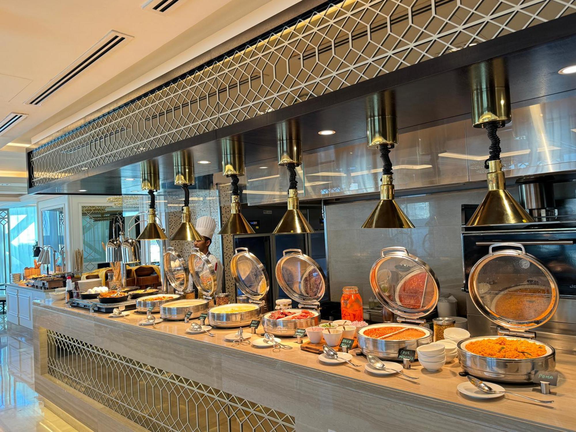 Shaza Doha Hotel Bagian luar foto A buffet at a hotel